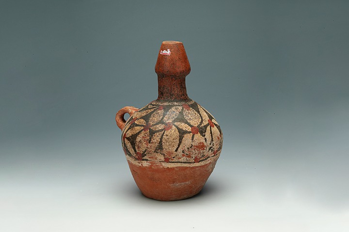 Painted pottery ewer with a single handle combines beauty and utility
