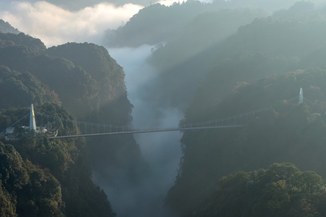 Aerial view of Sichuan’s Bifeng Gorge enveloped in morning mist
