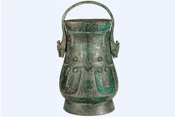 Shang Dynasty bronze wine container with beast mask motifs