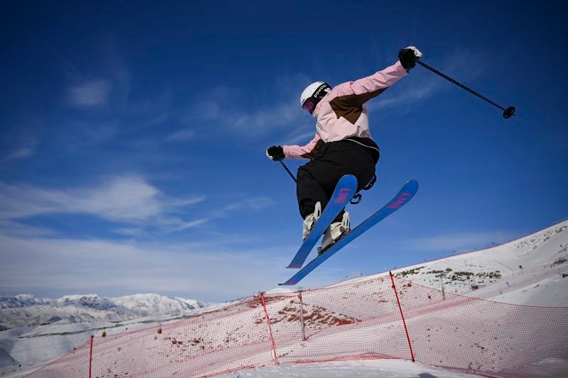 Former Xinjiang herder discovers prosperity and passion on the ski run