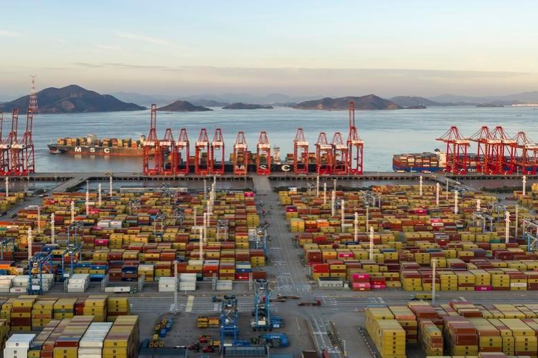 China expands imports, shares growth globally