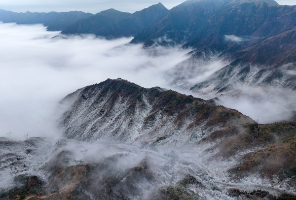 Tianhu resort wows guests with drifting clouds after snowfall