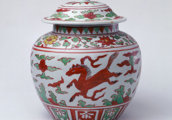 Ancient ceramic jar depicts horses galloping through clouds