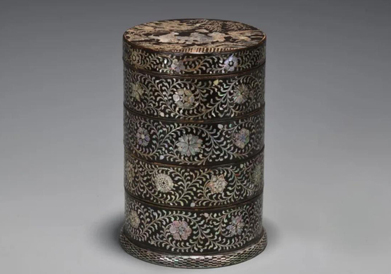 Ancient black lacquered storage box shimmers with mother-of-pearl decorations
