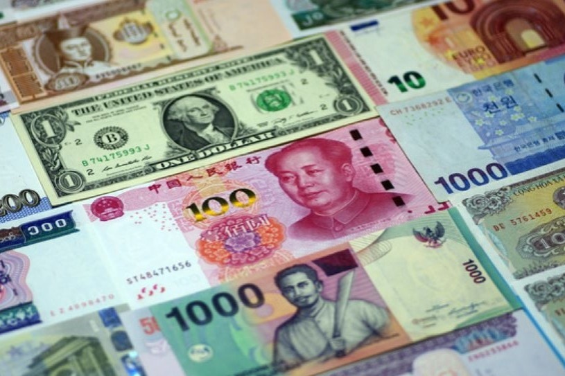 China's forex reserves snap seven-month rise as stronger dollar pressures assets