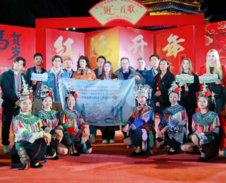 Global visitors immerse in Dong culture in Tongren