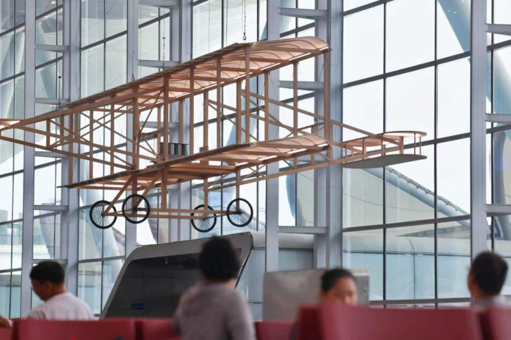 Guangzhou airport unveils replica of China's first airplane