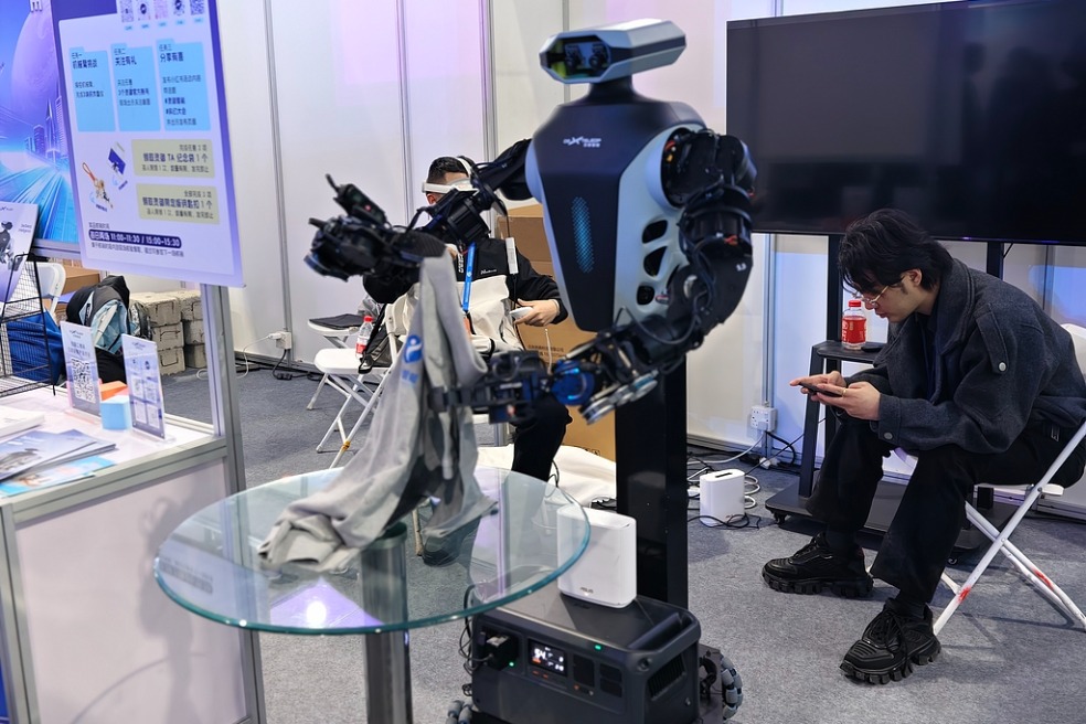 China's domestic service sector embraces robots, AI