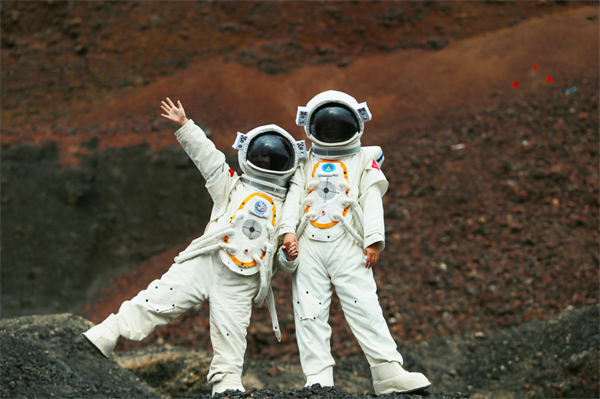 Tourists don spacesuits at Inner Mongolian volcano park