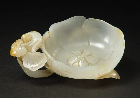 White jade flower-shaped cup serves as ancient brush washer