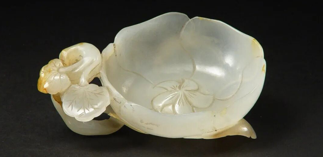 White jade flower-shaped cup serves as ancient brush washer