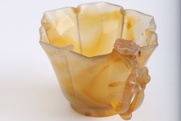 Yellow agate cup decorated with plum blossoms