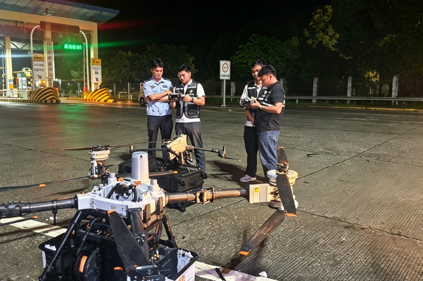State-owned drone operator aids overnight flood rescue in Guangxi