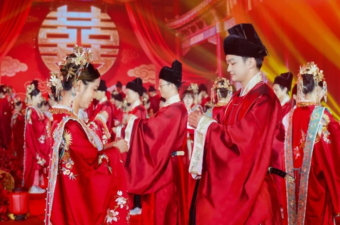Newlyweds celebrate love in traditional Chinese wedding