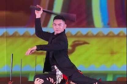 Jingpo sword dance opens Yunnan traditional ethnic sports games
